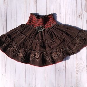 One kid Skrt brown with red stitching